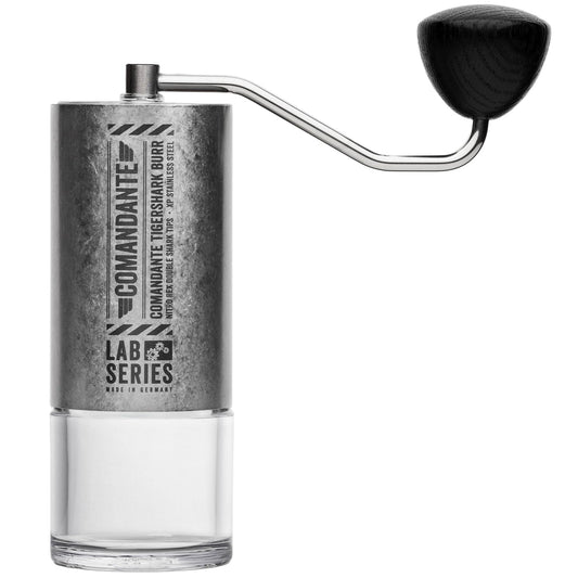 Manual coffee grinder with 'Comandante' branding on a white background